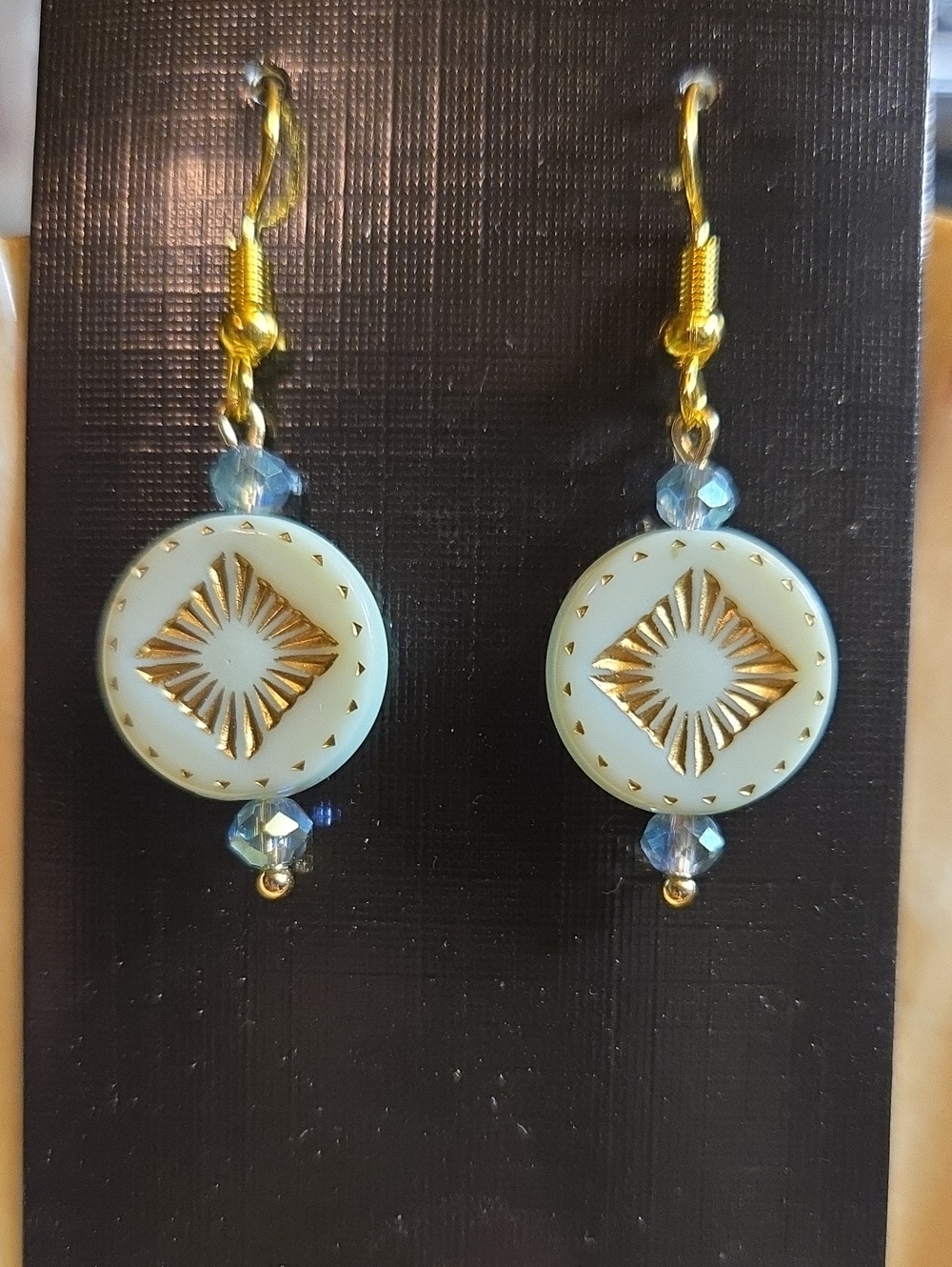 Gold Accent Light Blue Round Drop Earrings: A